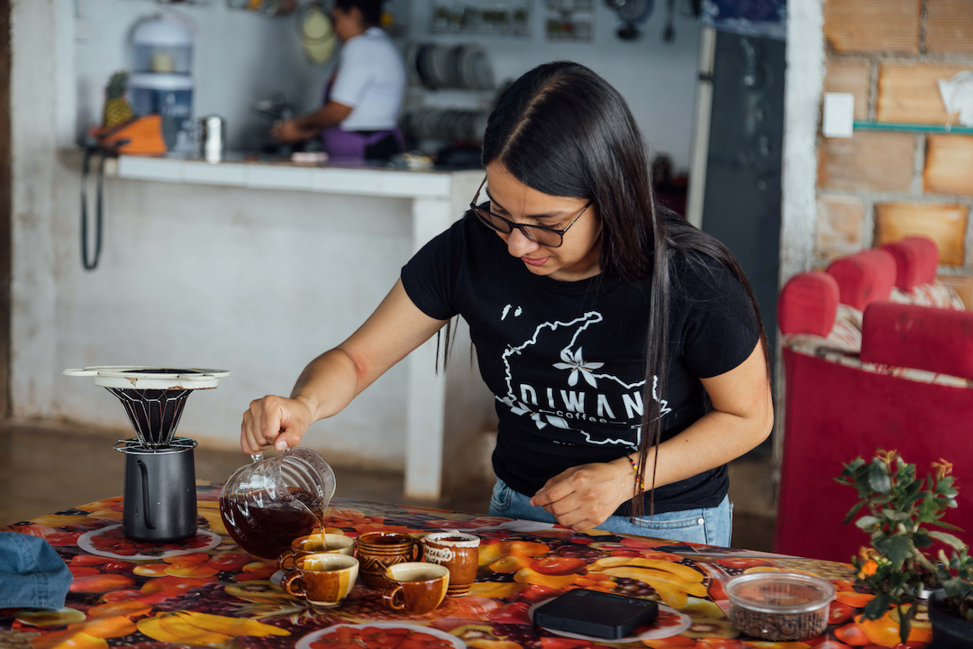 Yessica Parra, fourth-generation coffee grower and founder of Diwan Coffee, cupping coffee at her roastery in Pitalito, Colombia