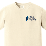Front of the Frothy Monkey Matchbook tee in cream, close view of the navy left chest print showing Kong the gorilla holding a steaming coffee mug beside the Frothy Monkey script logo, on a garment dyed Comfort Colors 1717 short sleeve t-shirt