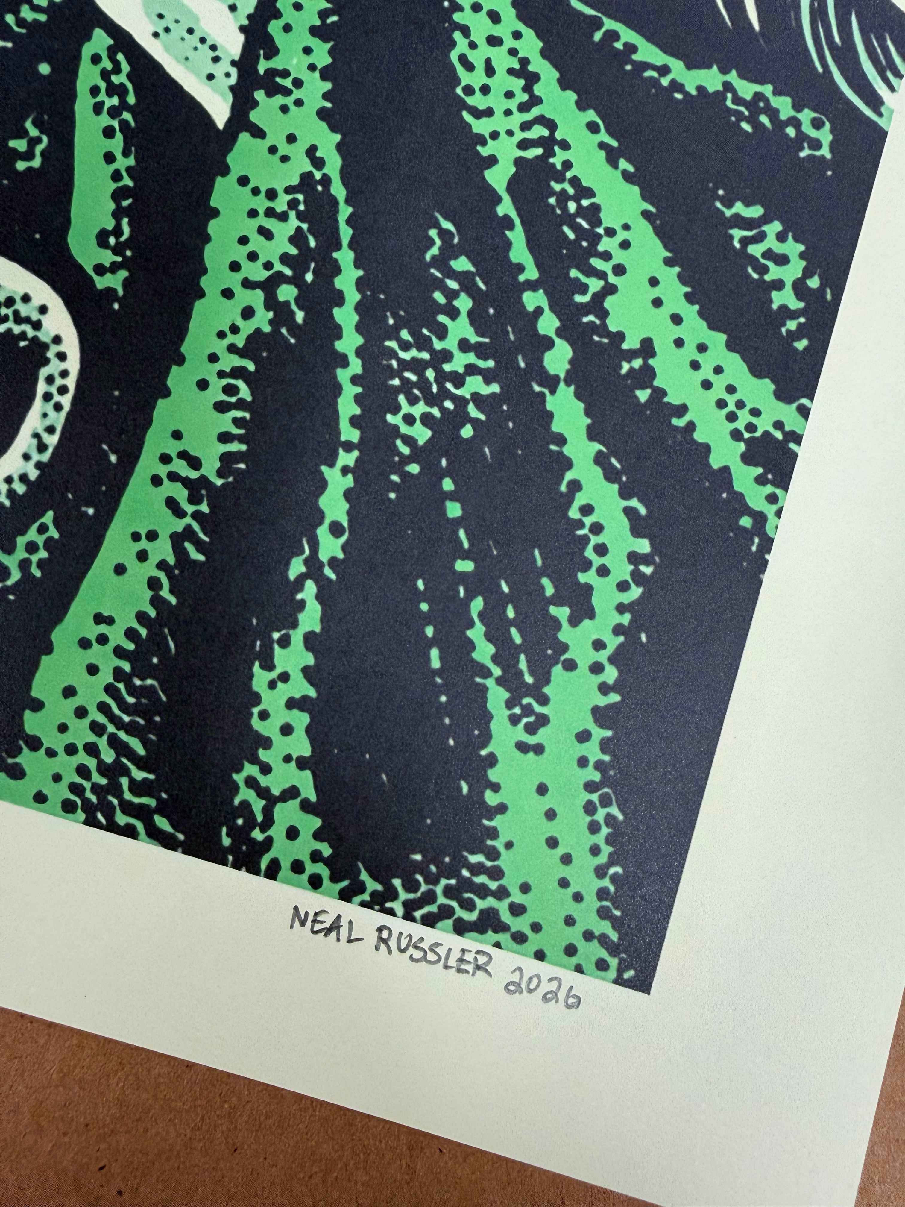 Close-up of Neal Russler's handwritten signature and 2026 date on the poster's bottom margin, showing the green and navy halftone print texture