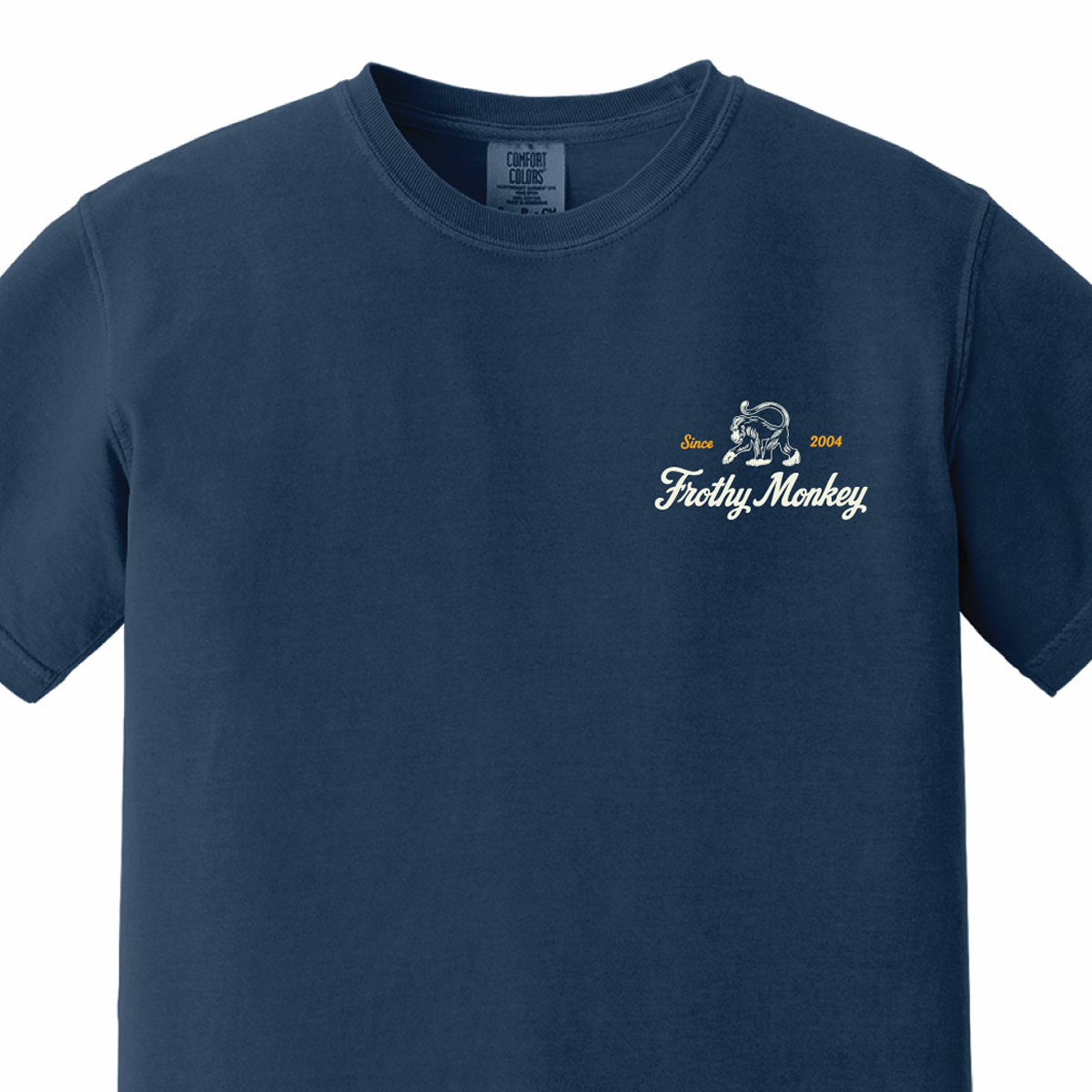 Frothy Monkey vintage logo tee in True Navy, front view with cream and marigold left chest print