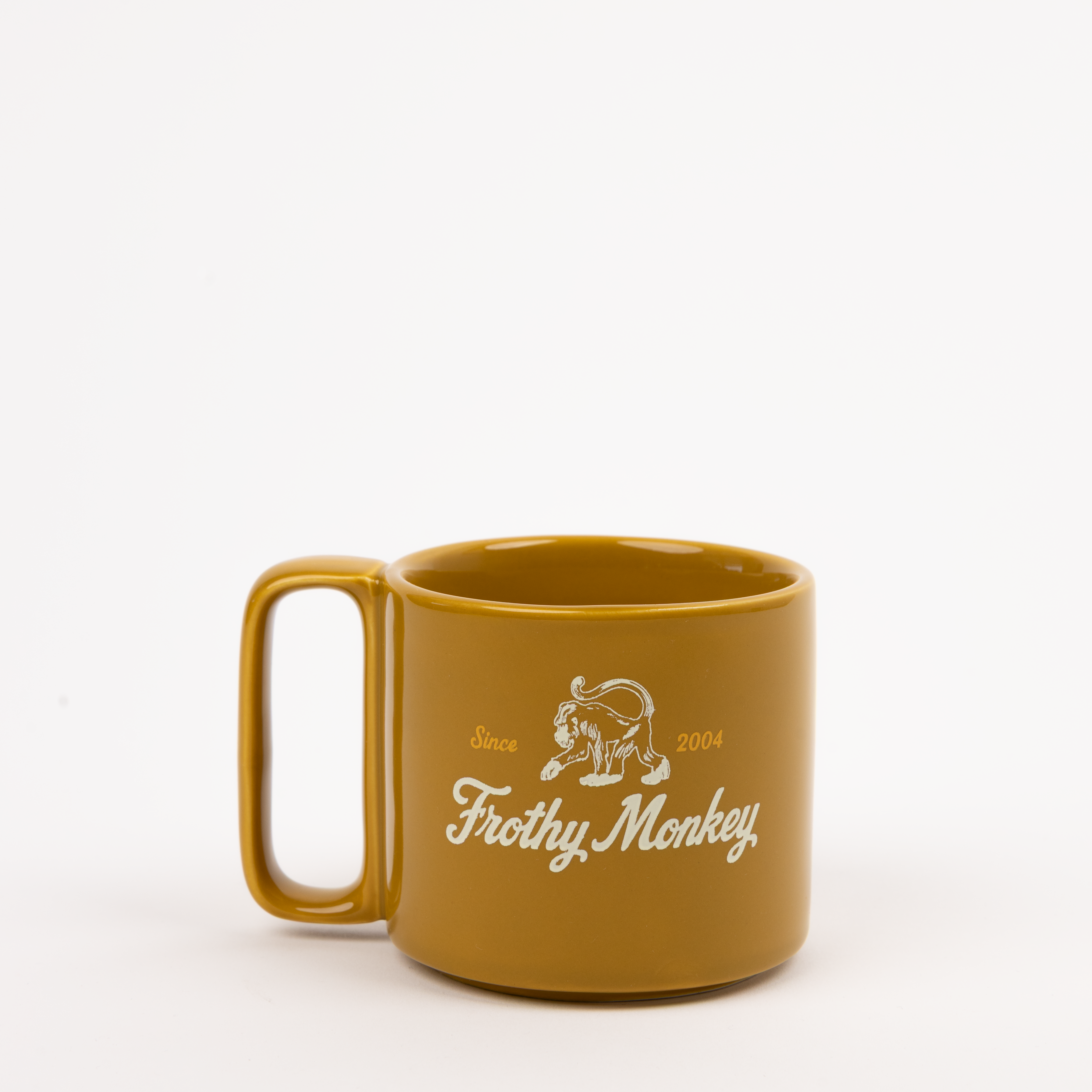 Single Frothy Monkey 10 oz stackable ceramic mug in Chai with vintage logo in cream and Brunch Yellow accents, side view